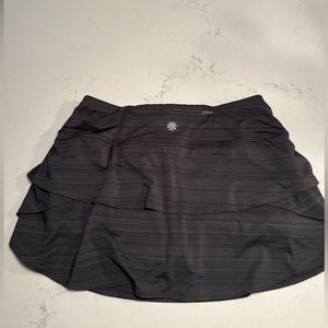 Athleta grey stripe tennis skirt with built-in mesh grip shorts. Ladies sz S